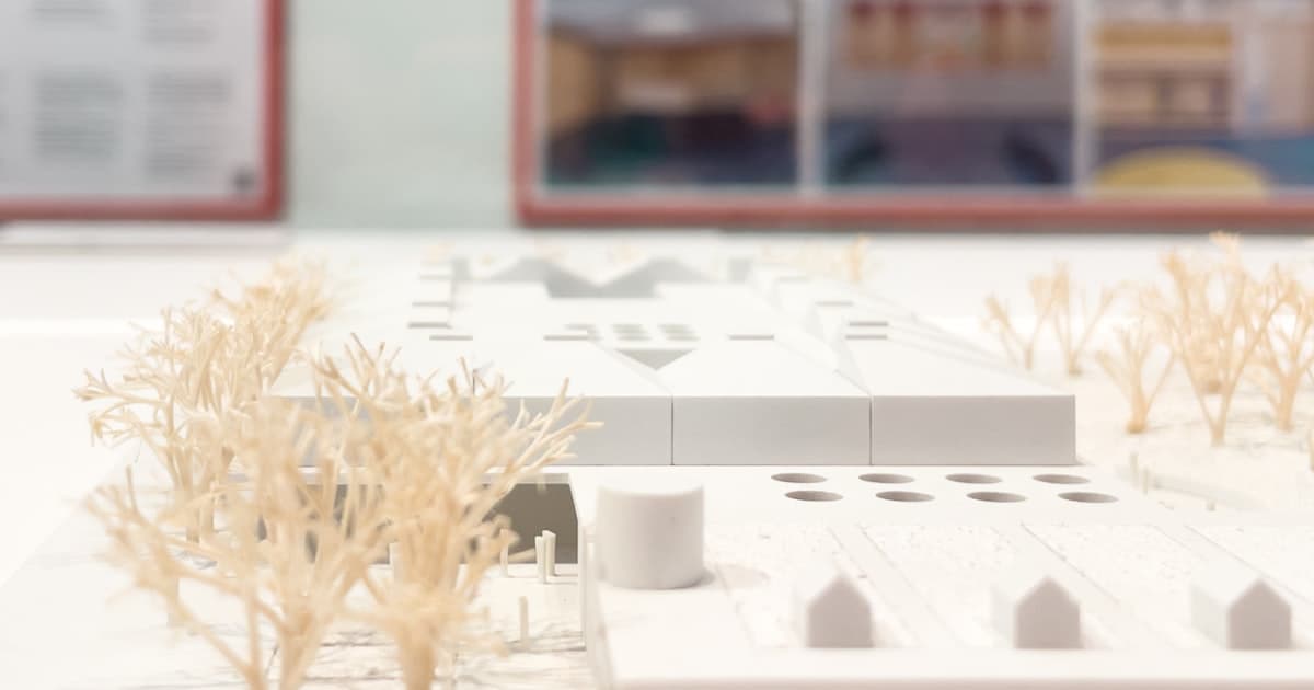 White architectural scale model with miniature trees